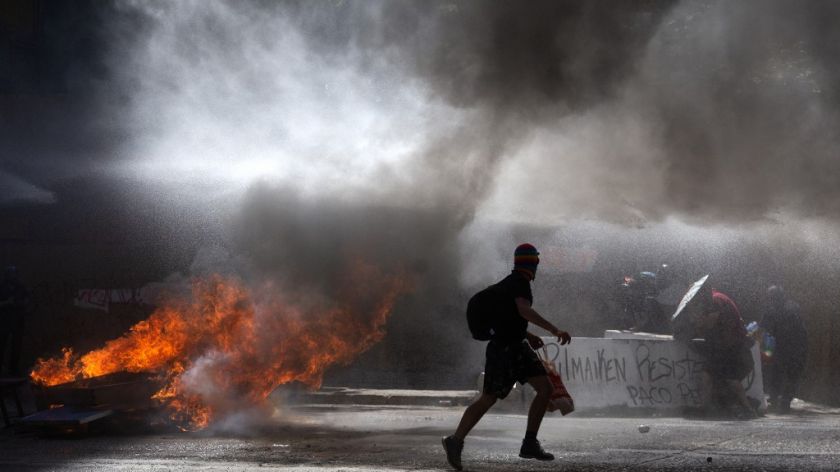 manifestantes chileno incendia iglesia